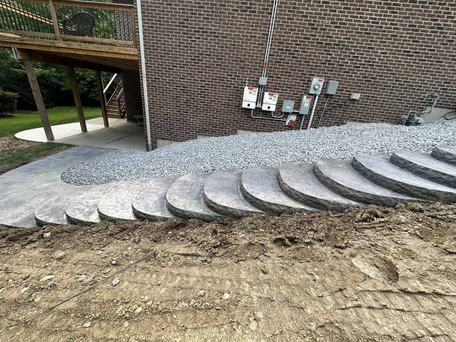 Concrete patio extension with a broad lawn view, Dayton & Springfield area